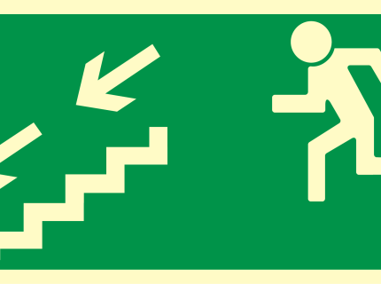 Kierunek do wyjścia drogi ewakuacyjnej schodami w dół (w lewo)
